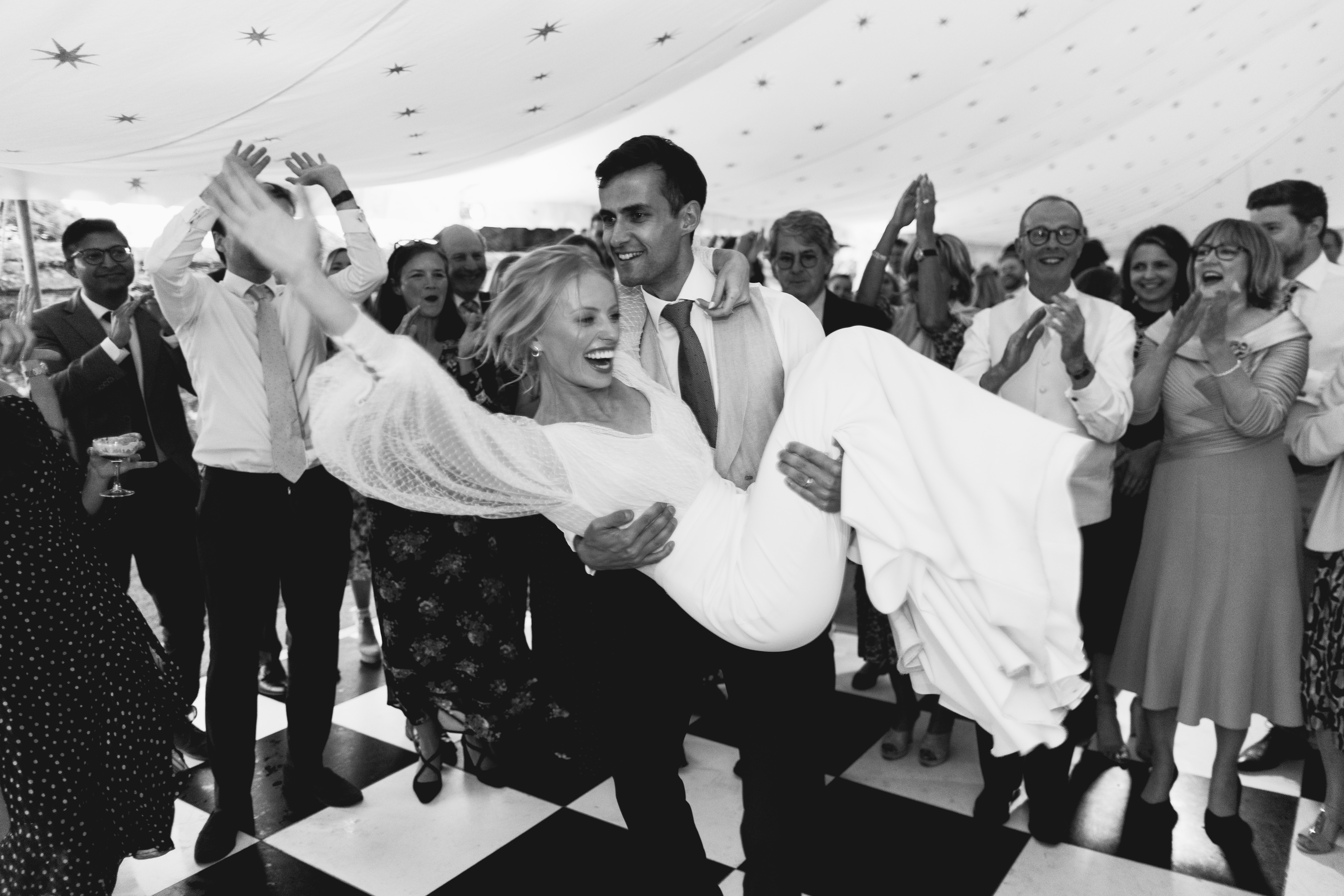 Black and white shot of the couple dancing during their south west wedding venue called Hatch House