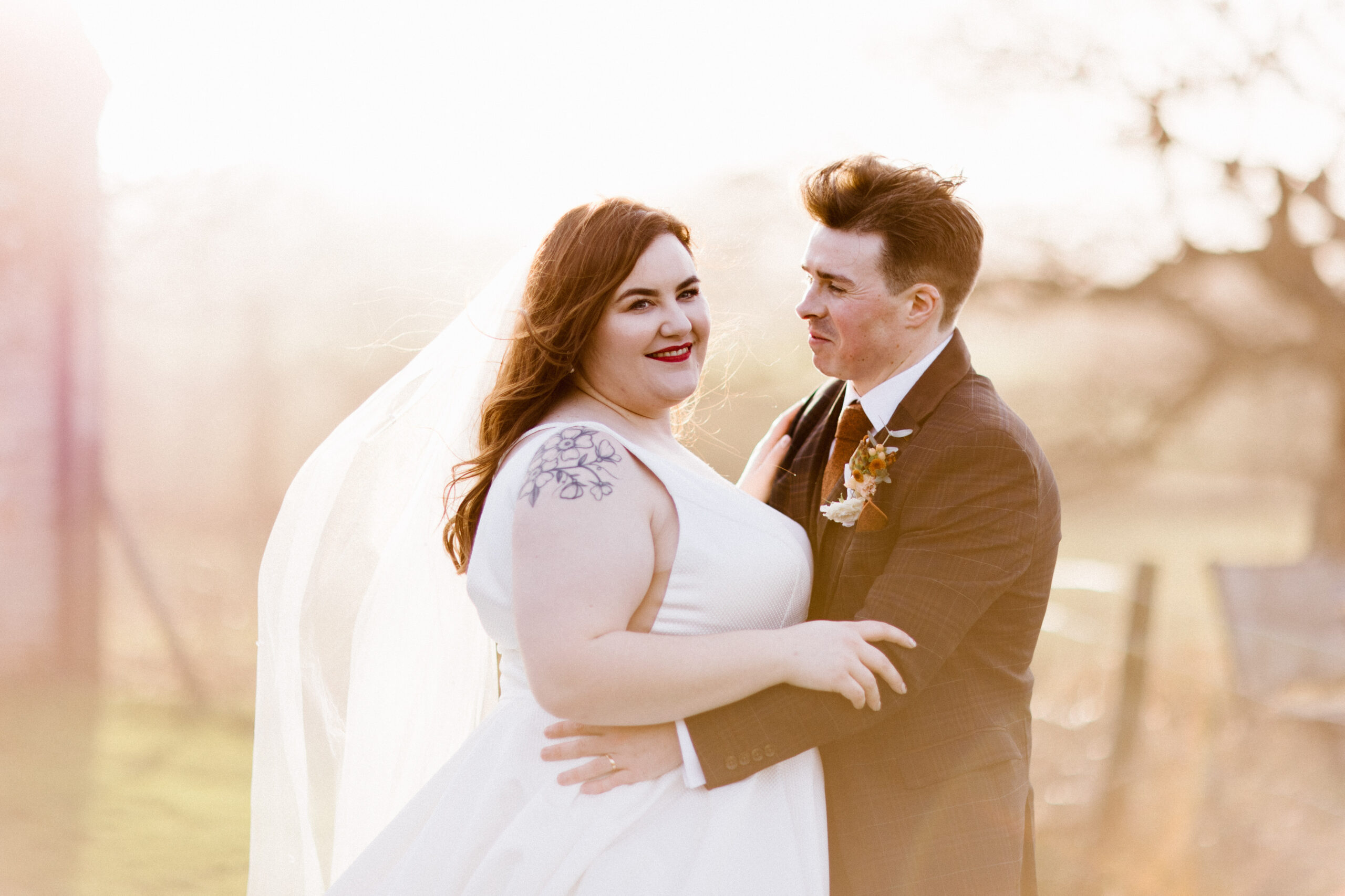 Outdoor couple shot at Barn wedding venue called Folly Farm