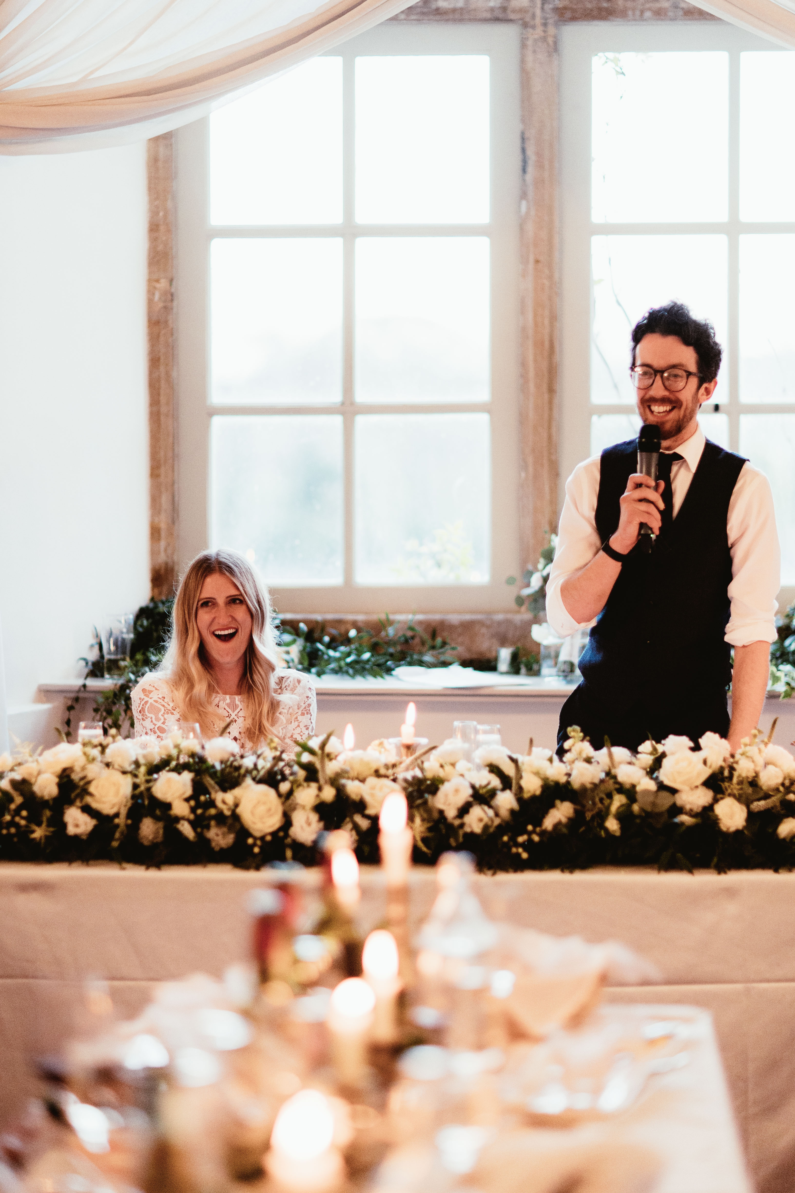 Couple during their speeches at their wedding venue in the south west called Brympton House