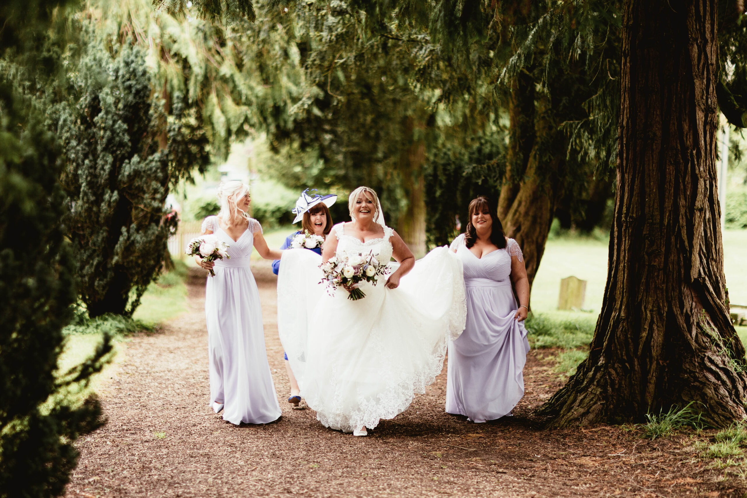 Bride and her bridesmaids at a wedding venue in the south west called Elmore Court 