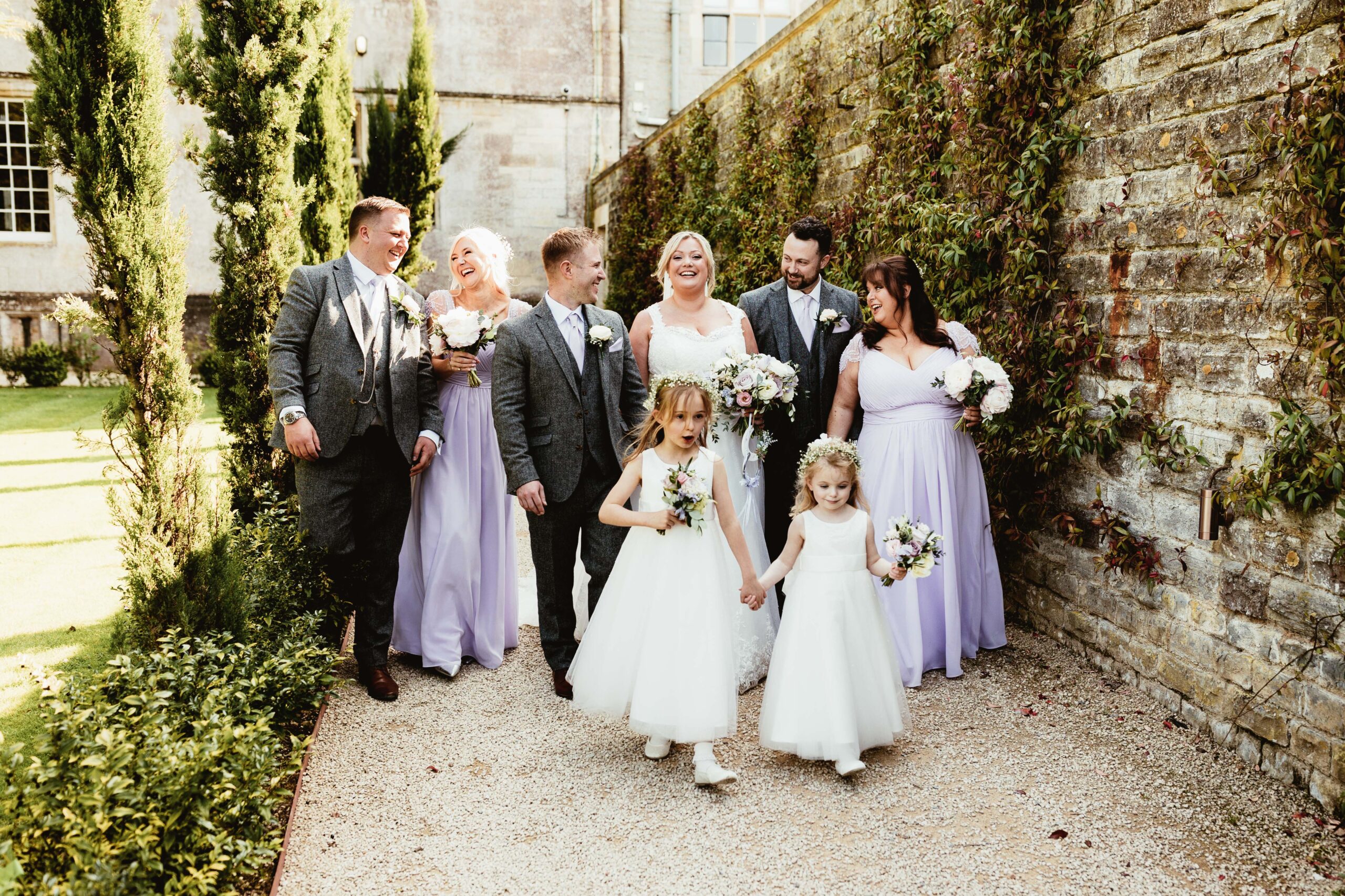 Couple and some of their guests at a wedding venue in the south west called Elmore Court 