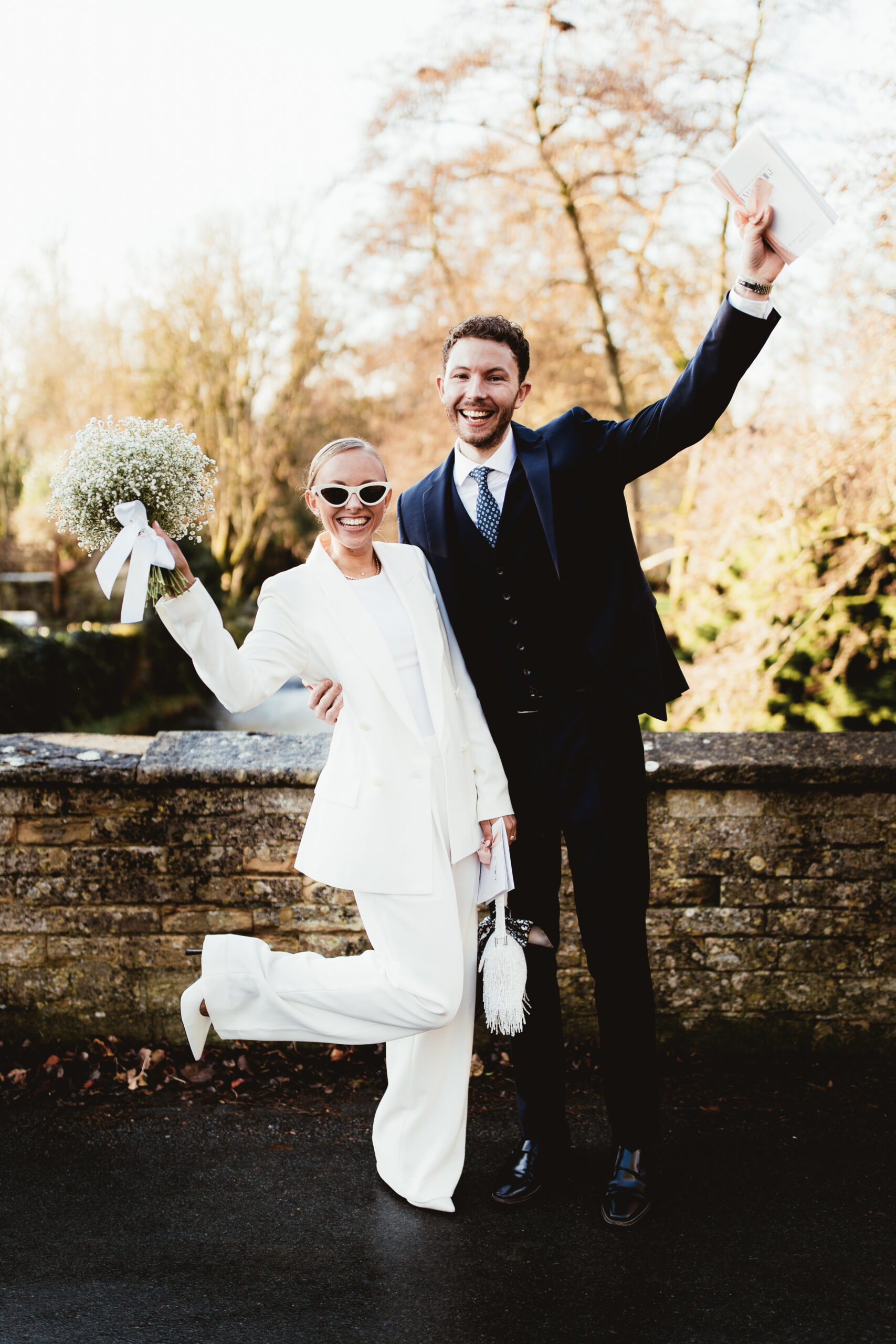Couple portrait outside at their barn wedding venue called Wild Thyme and Honey