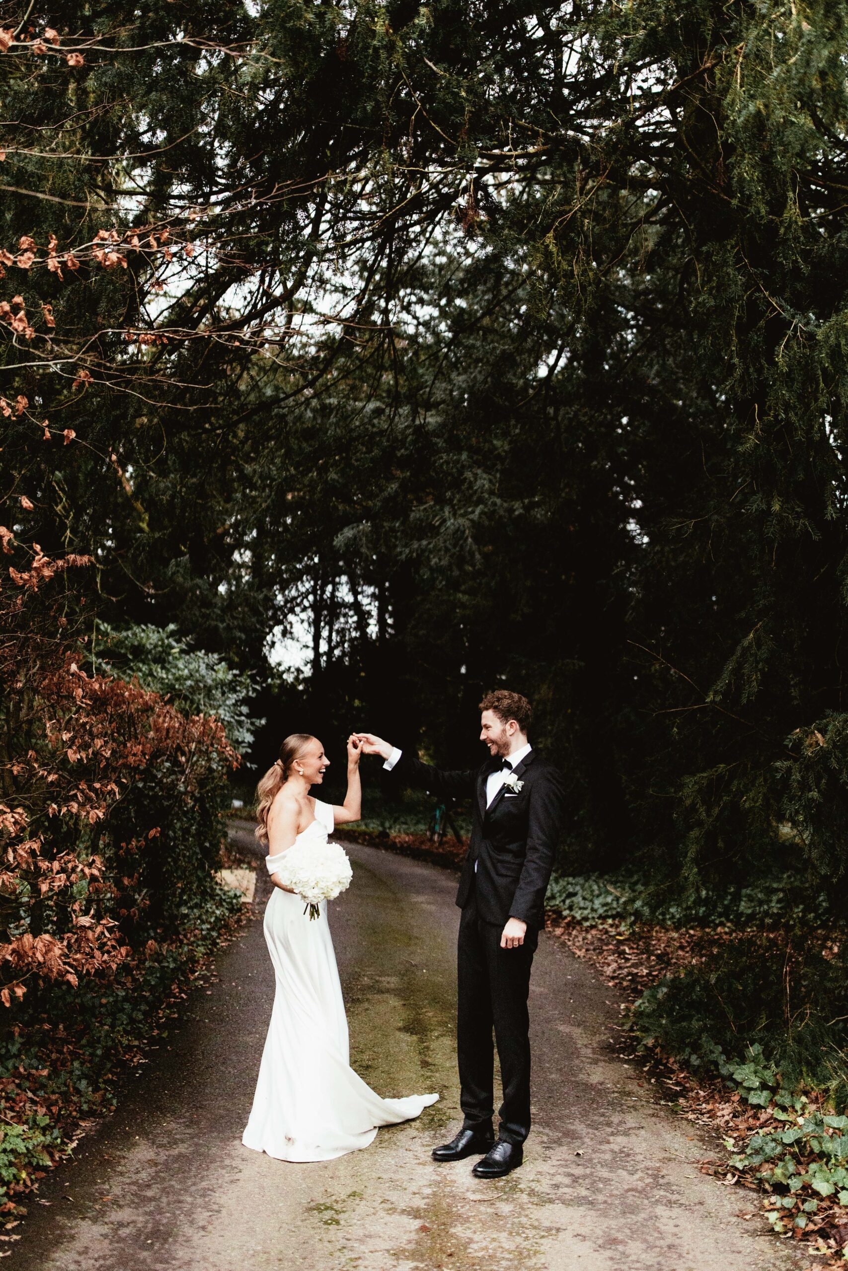 Couple portrait at their barn wedding venue called Wild Thyme and Honey